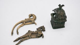 A pair of brass Betel nut crackers, one in the form of a horse and one as a bird. Along with a Roman