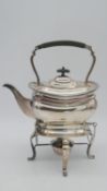 A Jays of Oxford Street, London silver plated spirit kettle, burner and stand with ebony handle. H.
