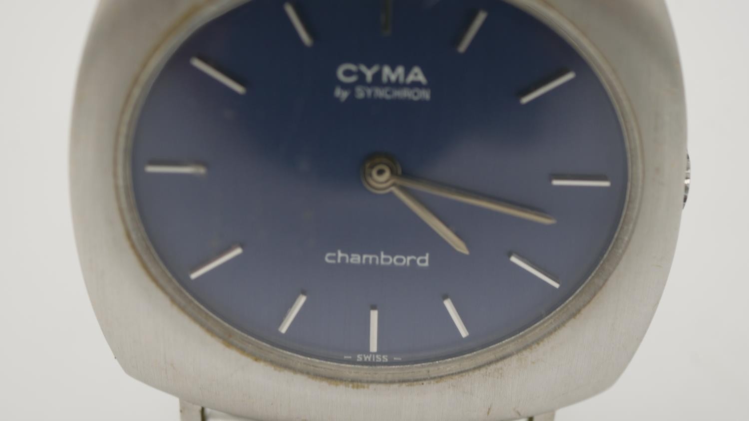 A vintage CYMA by Synchron, Chambord steel swiss watch with stretch strap and dark blue dial. - Image 3 of 3