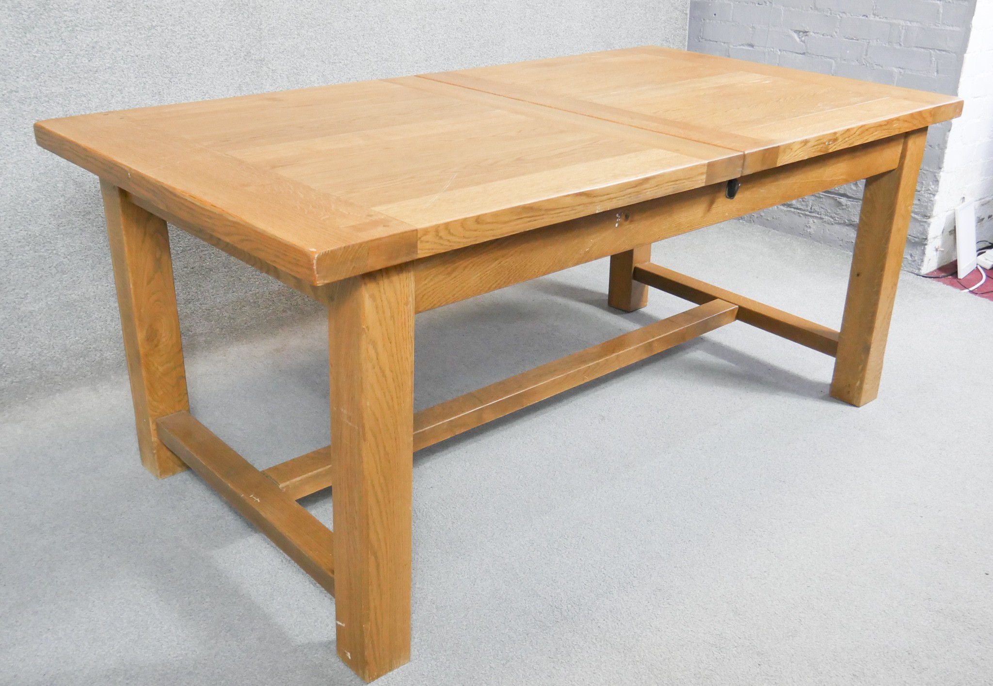 A contemporary John Lewis light oak planked top extending dining table on stretchered square - Image 3 of 5