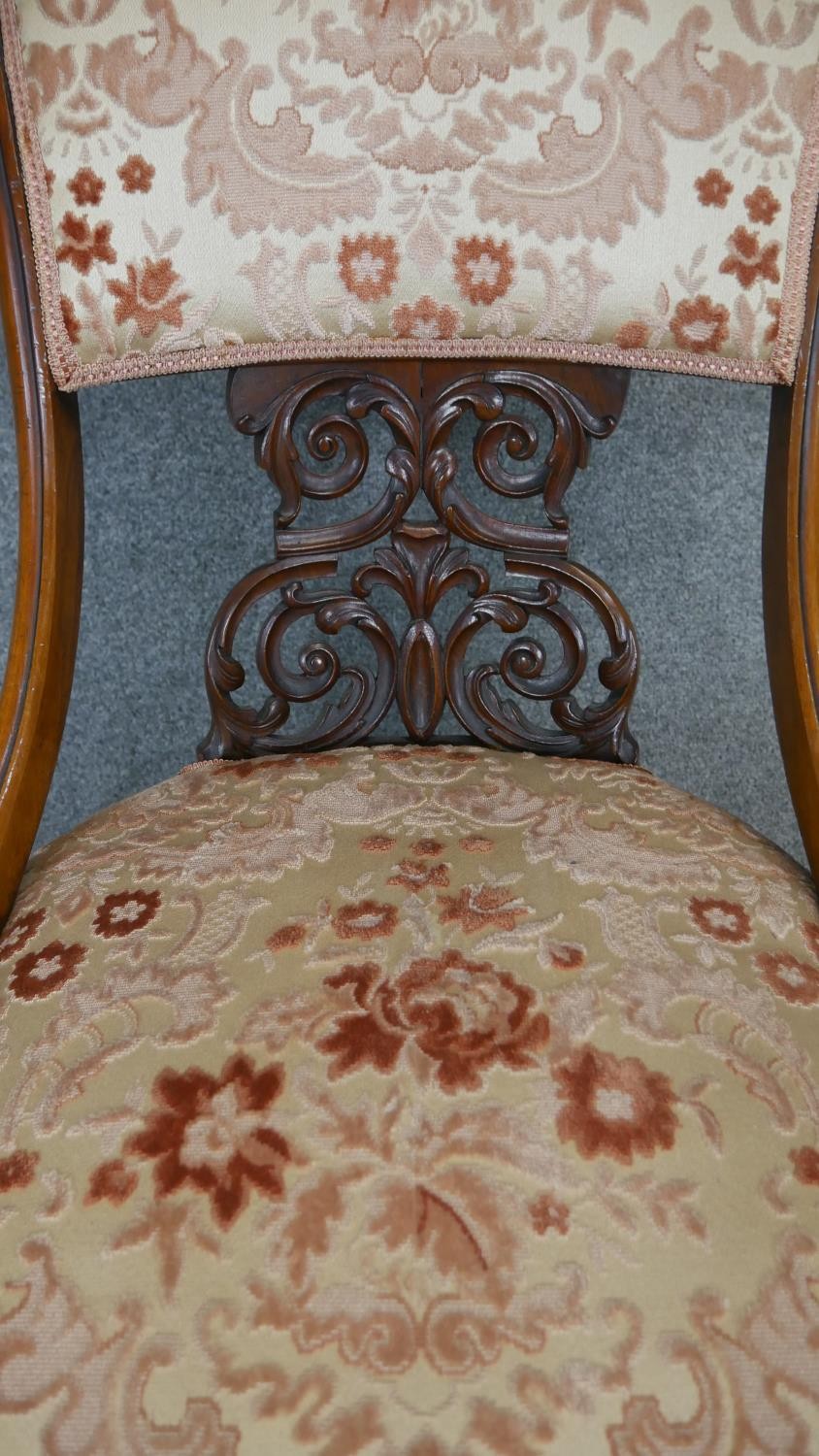 A Victorian carved walnut nursing chair on cabriole supports. - Image 4 of 4