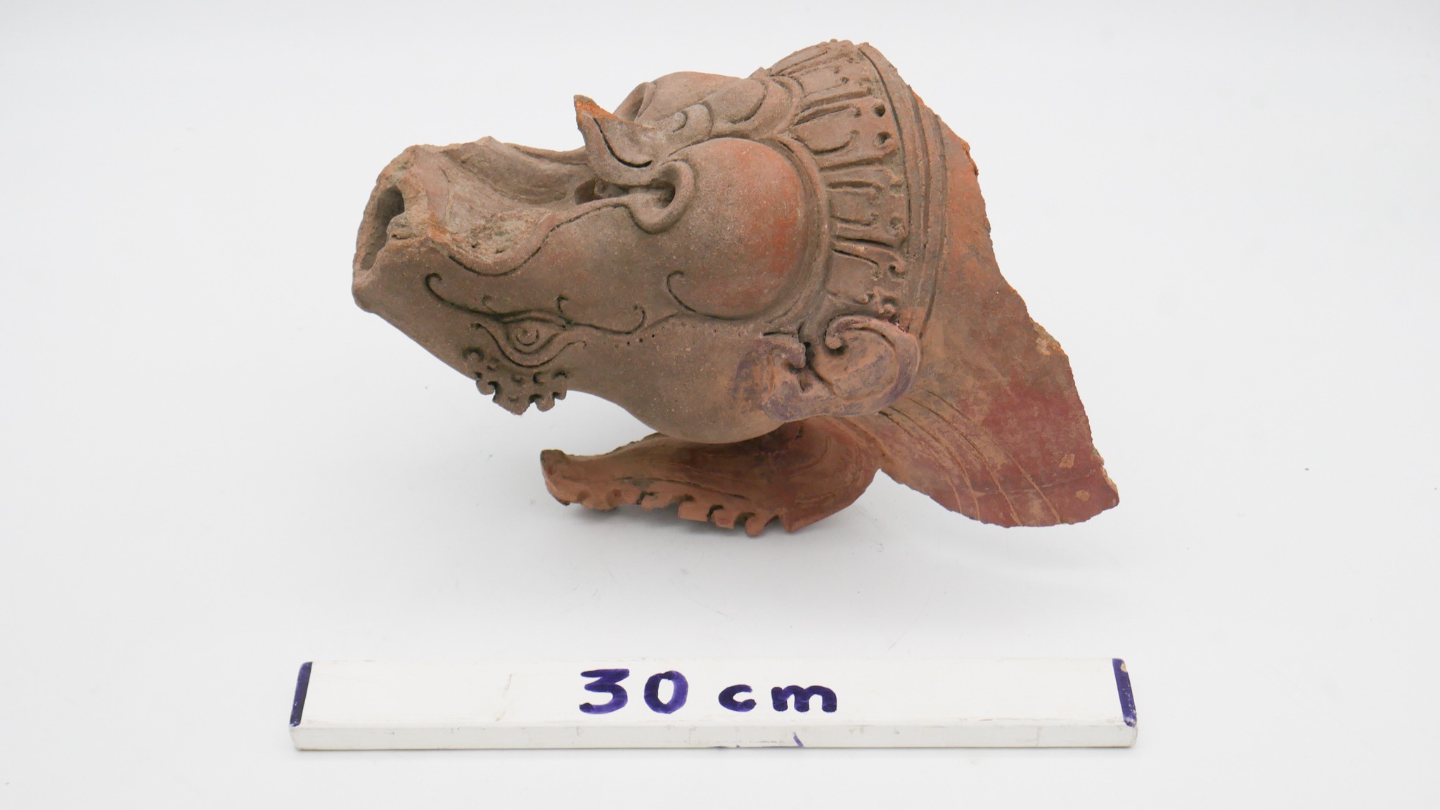 An Oriental terracotta mythical creatures head. H.30 W.19cm - Image 2 of 4