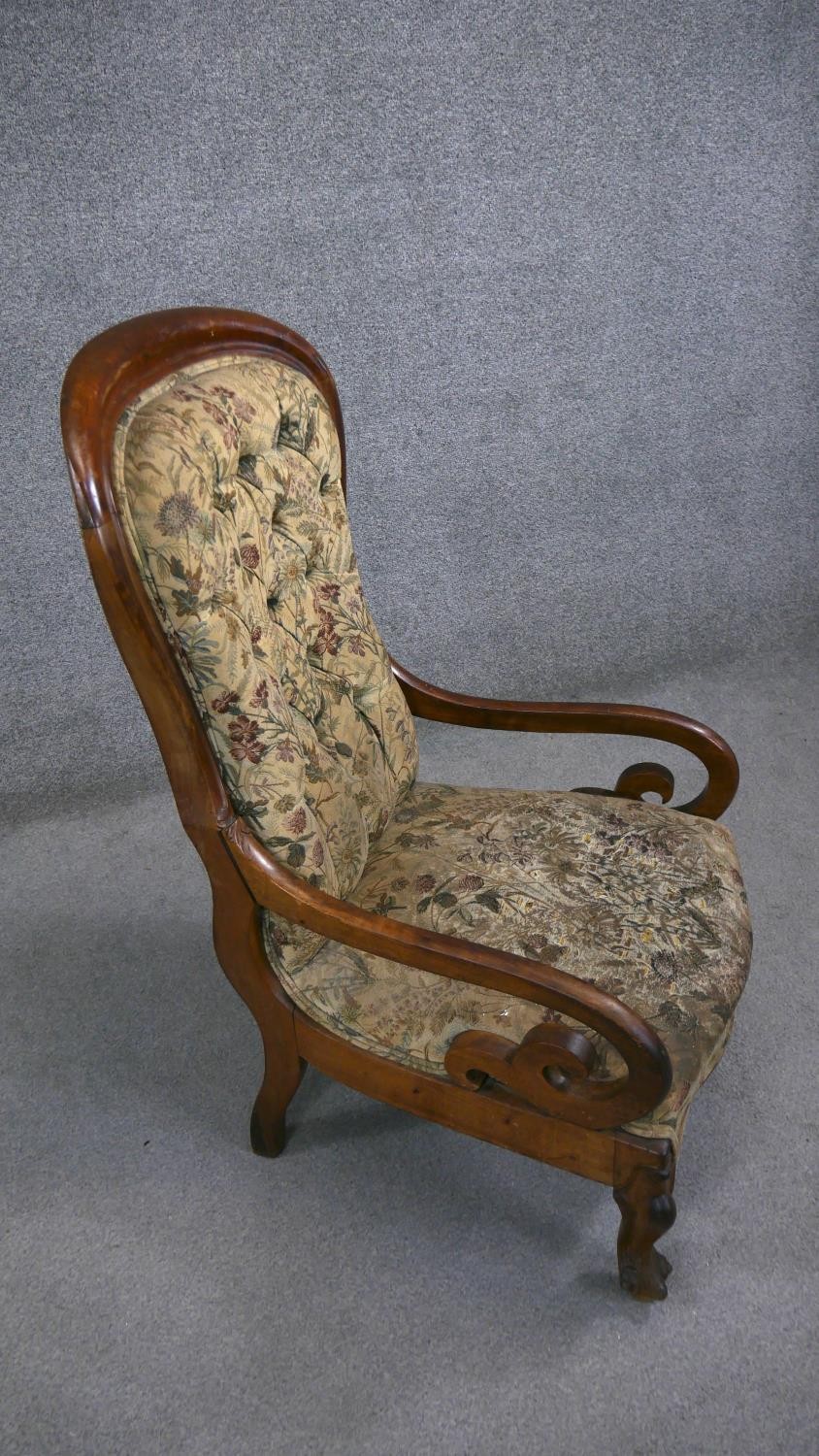 A 19th century mahogany framed spoon back armchair in deep buttoned upholstery on carved cabriole - Image 4 of 5
