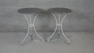 A pair of vintage metal topped conservatory tables on swept tripod bases. H.73 D.50