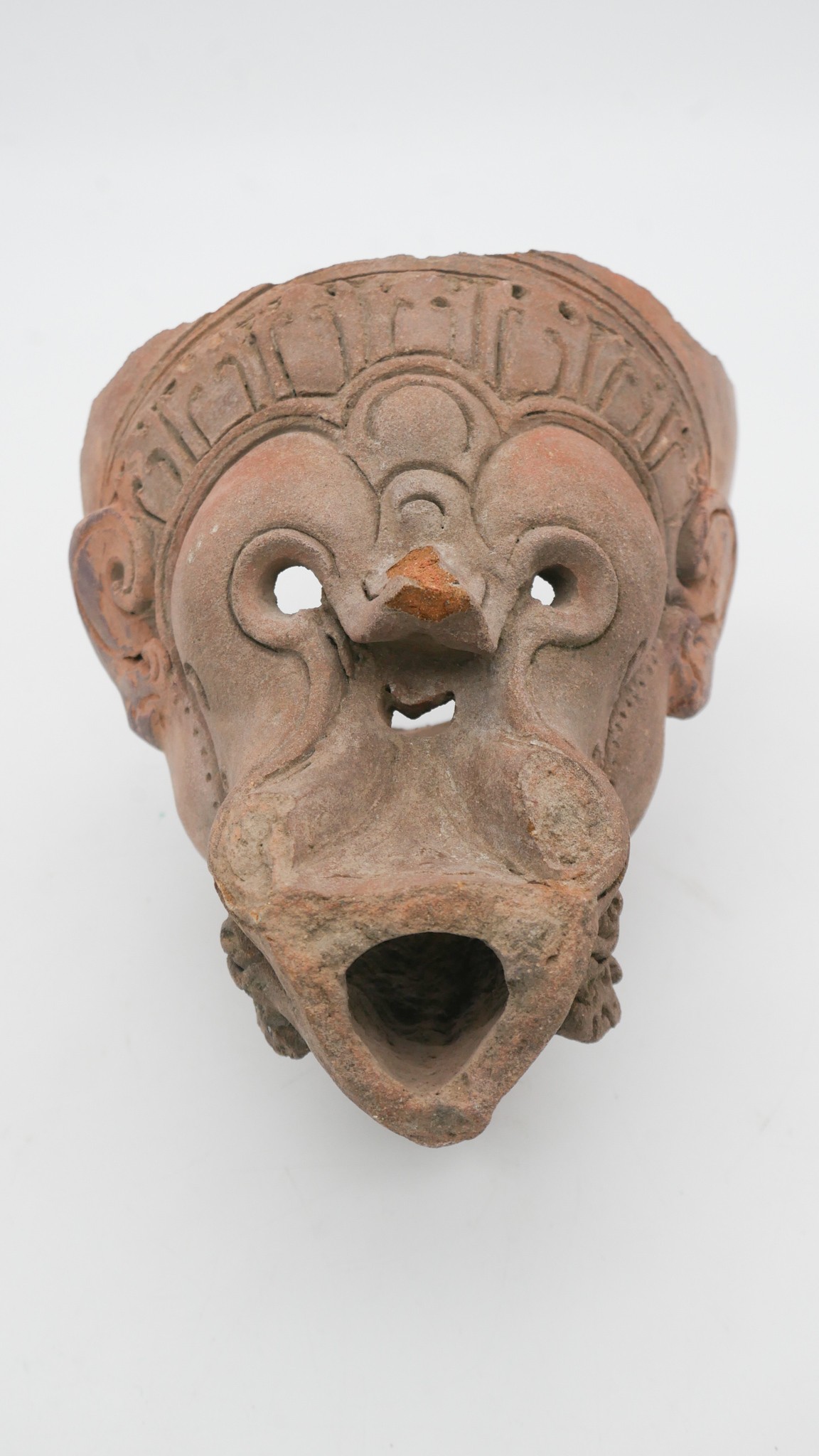 An Oriental terracotta mythical creatures head. H.30 W.19cm - Image 3 of 4