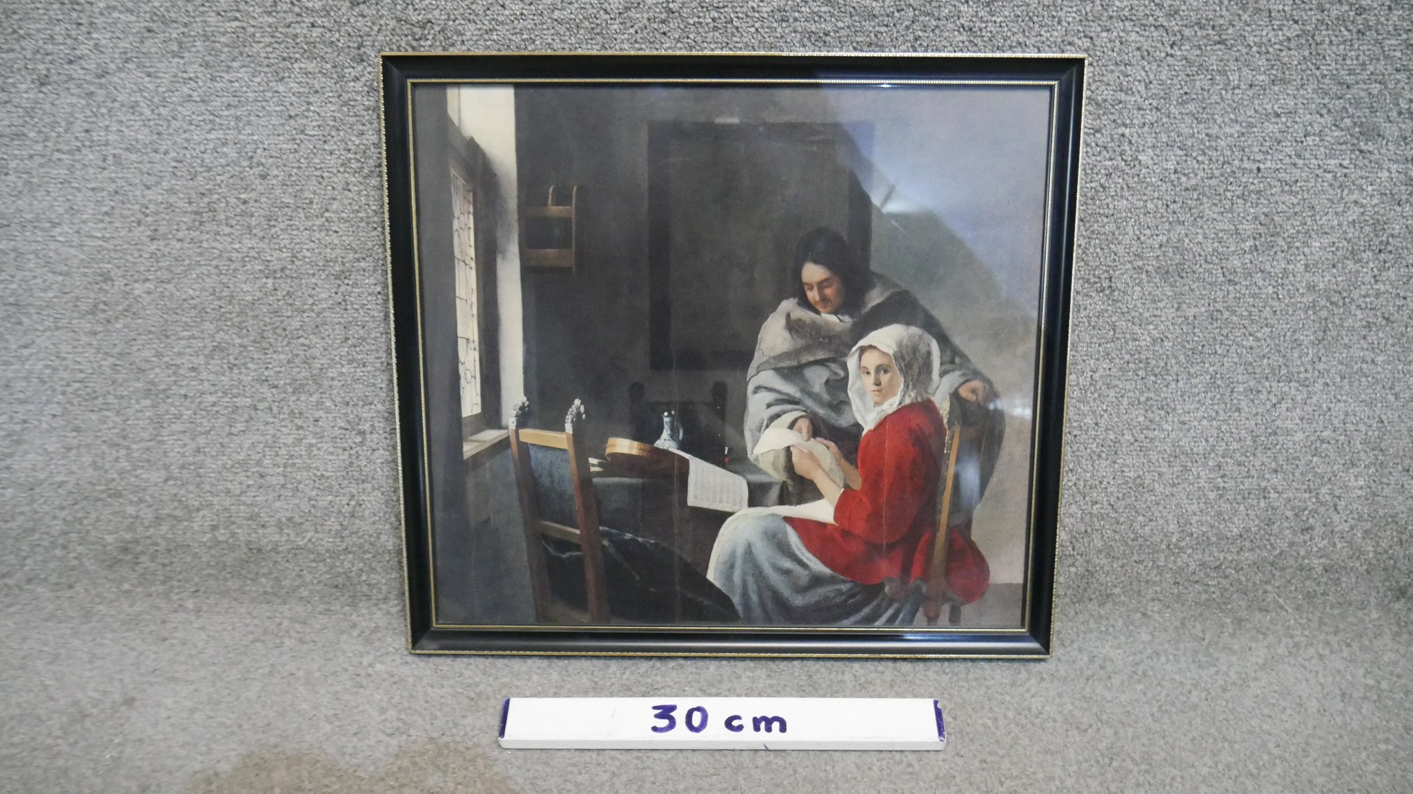 A framed and glazed coloured print of Johannes Vermeer oil on canvas titled 'Young Woman Interrupted - Image 3 of 3