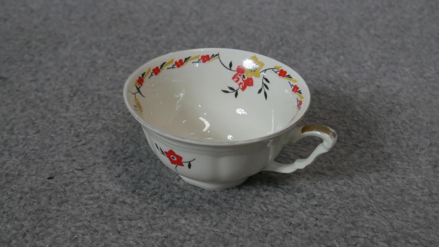 An Art Deco transfer printed floral design six person porcelain tea set (two cups missing), 11 - Image 3 of 5