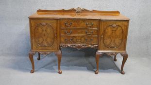 A vintage mid Georgian style burr walnut Epstein sideboard on carved cabriole supports. H.100 W.