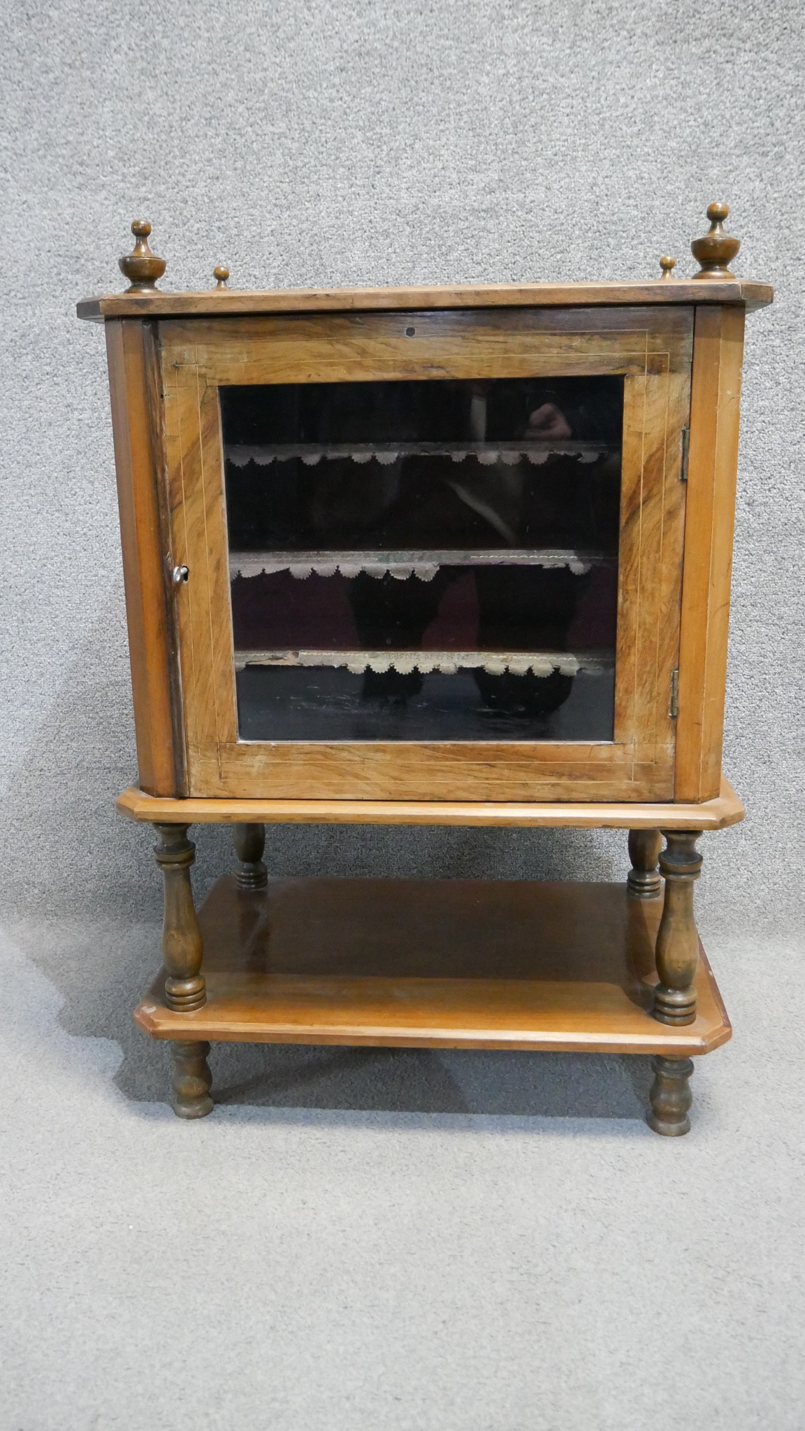 A Victorian walnut and satinwood inlaid music cabinet fitted with sheet music shelves. H. 80 W. 60