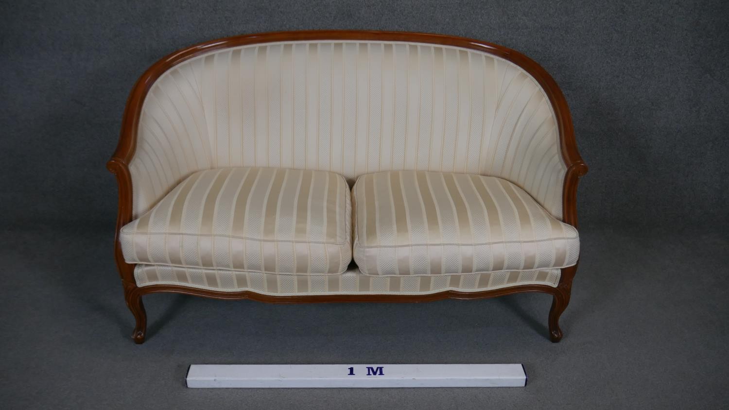 A Louis XV style two seater canape in striped upholstery on carved cabriole supports. - Image 2 of 5