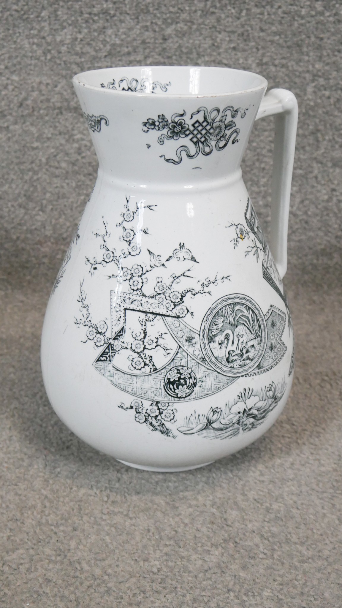 Two Victorian transfer design ceramic wash jugs. One with an Oriental fan design and one with roses. - Image 6 of 7