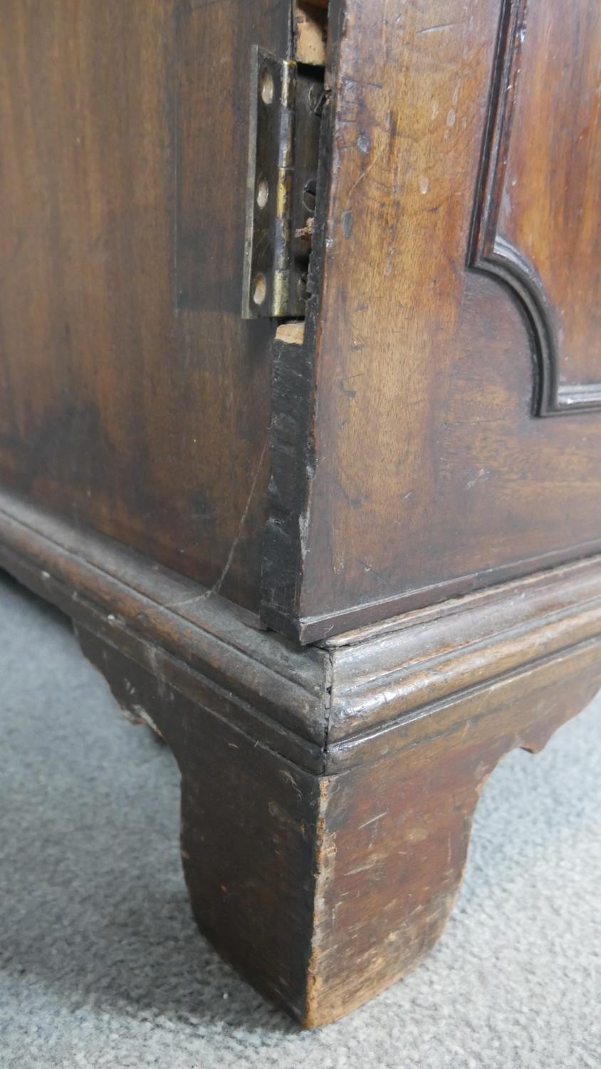 A Georgian mahogany side cabinet with panel doors enclosing open space on bracket feet. H.107 W.96 - Image 3 of 4