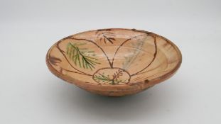 A Bamiyan style ceramic hand painted floral design bowl. Diam. 28cm
