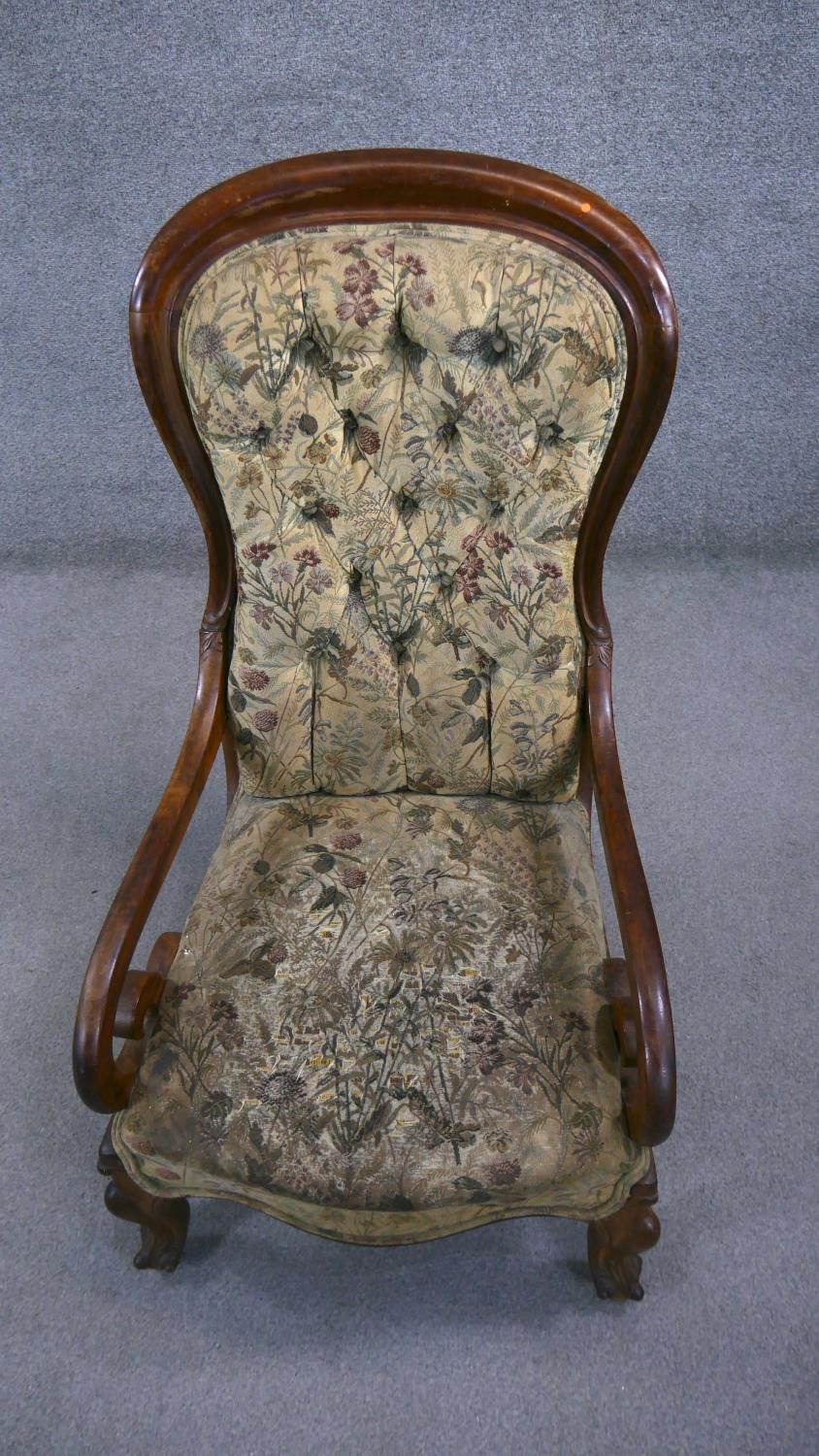 A 19th century mahogany framed spoon back armchair in deep buttoned upholstery on carved cabriole - Image 2 of 5