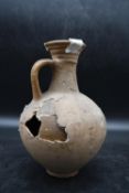 A Single Handed Roman Clay Pitcher dated AD 100. Accompanied by provenance. H.25cm