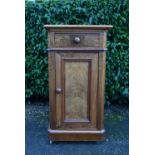 A 19th century Continental figured walnut pot cupboard. H.83 W.45 D.40cm