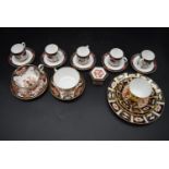 A collection of eight 20th century bone china cups and saucers. To include five coffee cups and