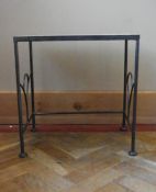 A wrought iron conservatory table with mosaic inlaid top. H.50 W.50 D.32cm