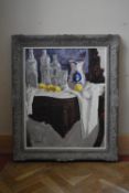 A 20th century framed oil on canvas, still life arrangement on a chiffonier, indistinctly signed and