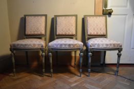 A set of three late C19th painted frame Louis XVI style dining chairs in floral upholstery on