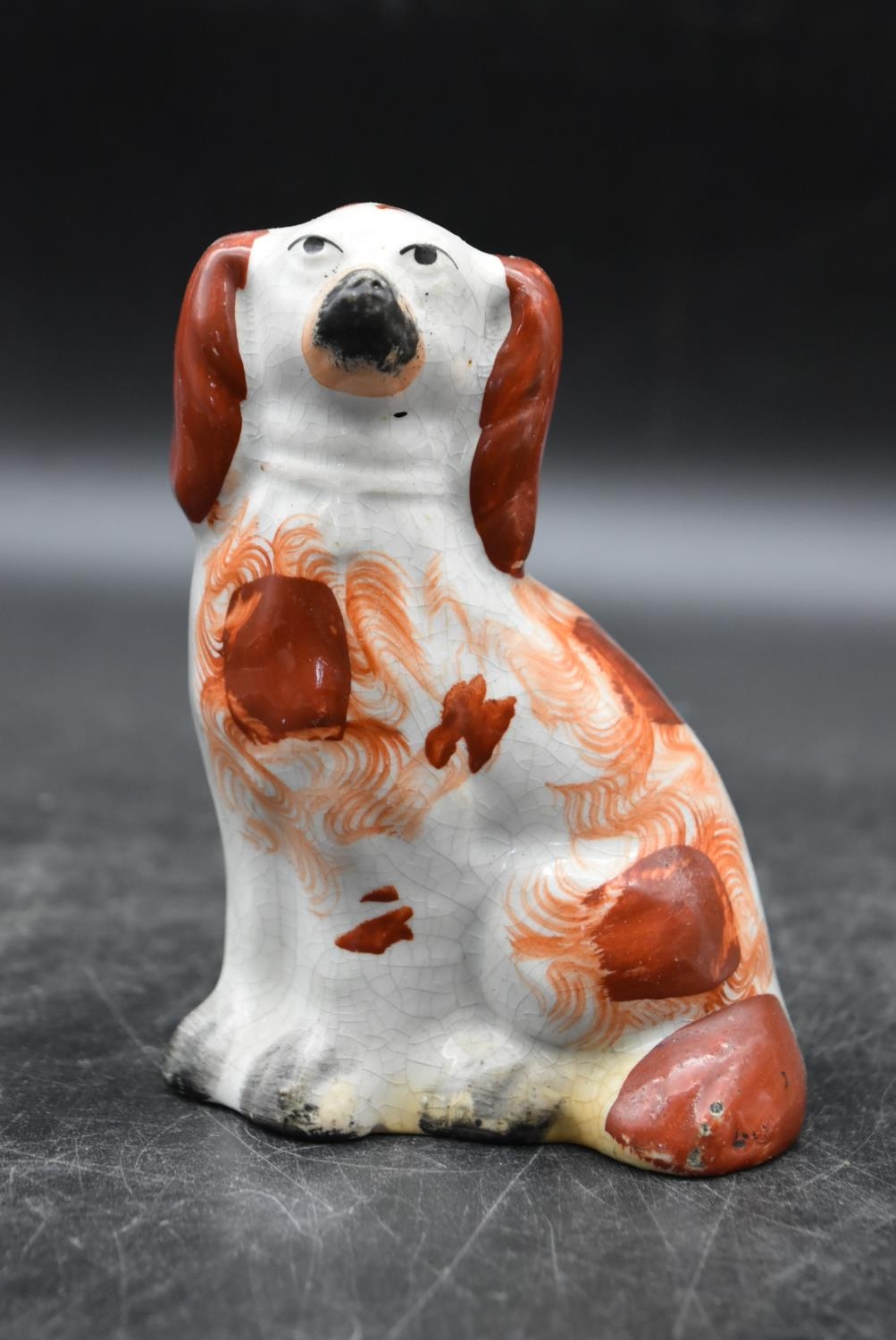 A collection of three 19th century tan and white Staffordshire spaniels. Largest H.26 W.19cm (3) - Image 5 of 9