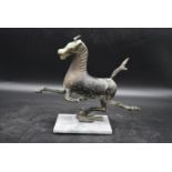 The Flying Horse of Gansu - Han dynasty (25-100ad) A Chinese Bronze horse in a flight treading on