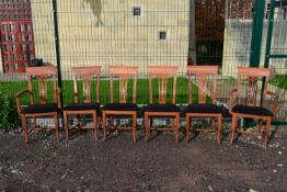 A set of six Italian cherrywood dining chairs.