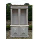 A C.1900 French Provincial painted two section bookcase the upper section fitted with mesh doors