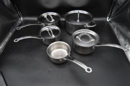 A set of five stainless steel 'Jame Oliver - Tefal' Kitchenware. To include a Casserole pot with lid