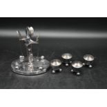 A Victorian silver cruet set, with spoons and stand by Howson Brothers. Includes four cruets with