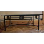 A metal framed coffee table with plate glass top. H.40 W.100 D.60cm
