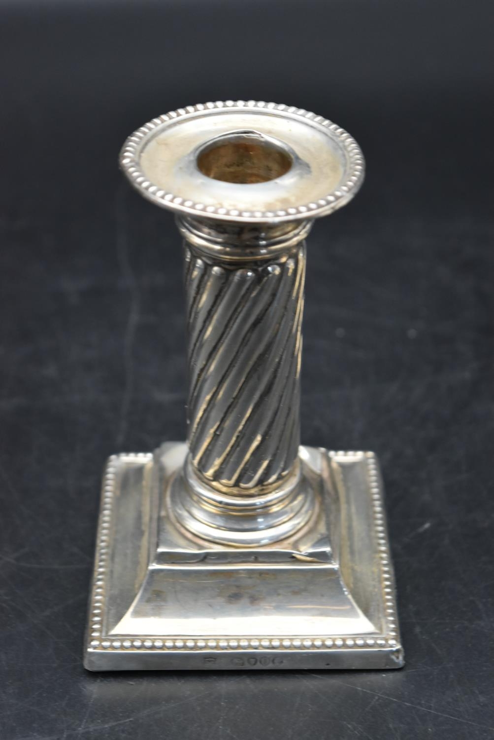 A pair of silver candlesticks with a twisted style to the column and beading decoration to the base, - Image 8 of 13