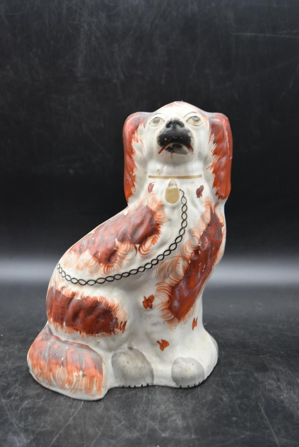 A collection of three 19th century tan and white Staffordshire spaniels. Largest H.26 W.19cm (3) - Image 2 of 9