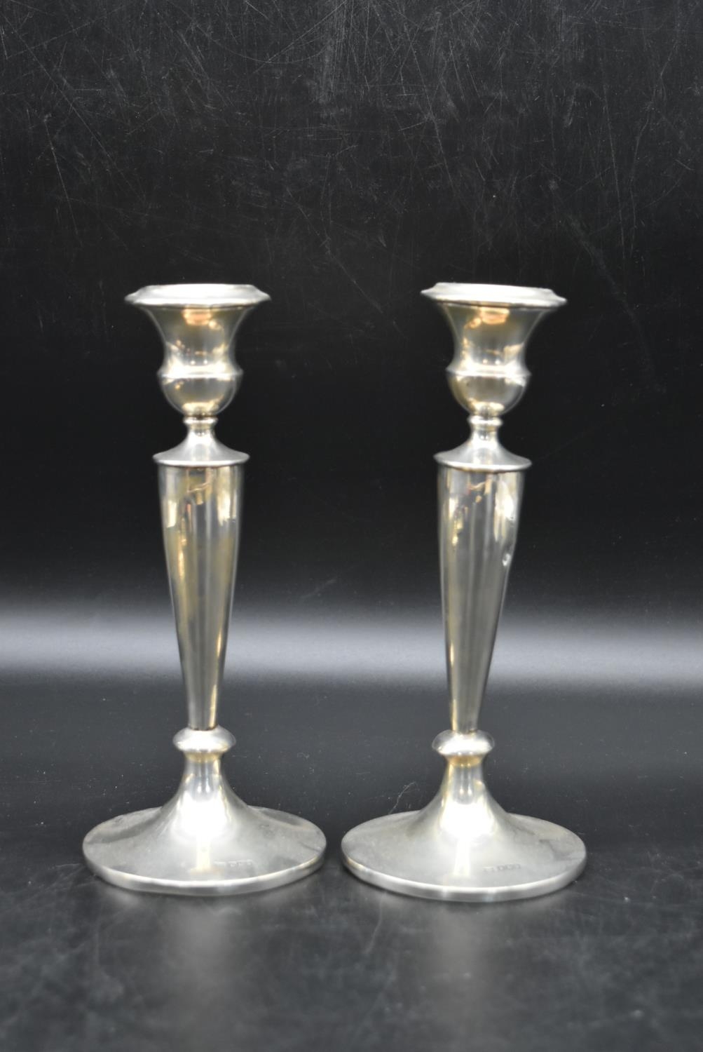 A pair of silver candlesticks with a twisted style to the column and beading decoration to the base, - Image 2 of 13