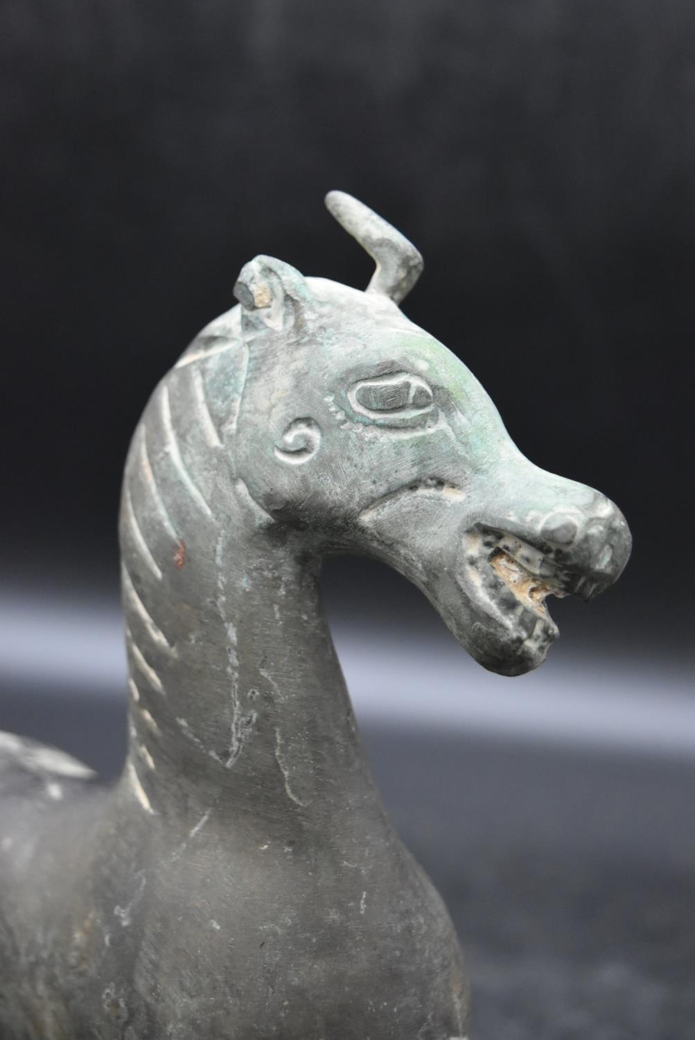 The Flying Horse of Gansu - Han dynasty (25-100ad) A Chinese Bronze horse in a flight treading on - Image 6 of 11