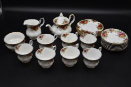 A Royal Albert tea set. Including seven cups, six saucers, six plates, teapot, milk jug and sugar