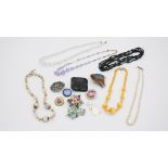 A collection of mixed jewellery. Including two Czech glass necklaces one with lilac faceted beads, a