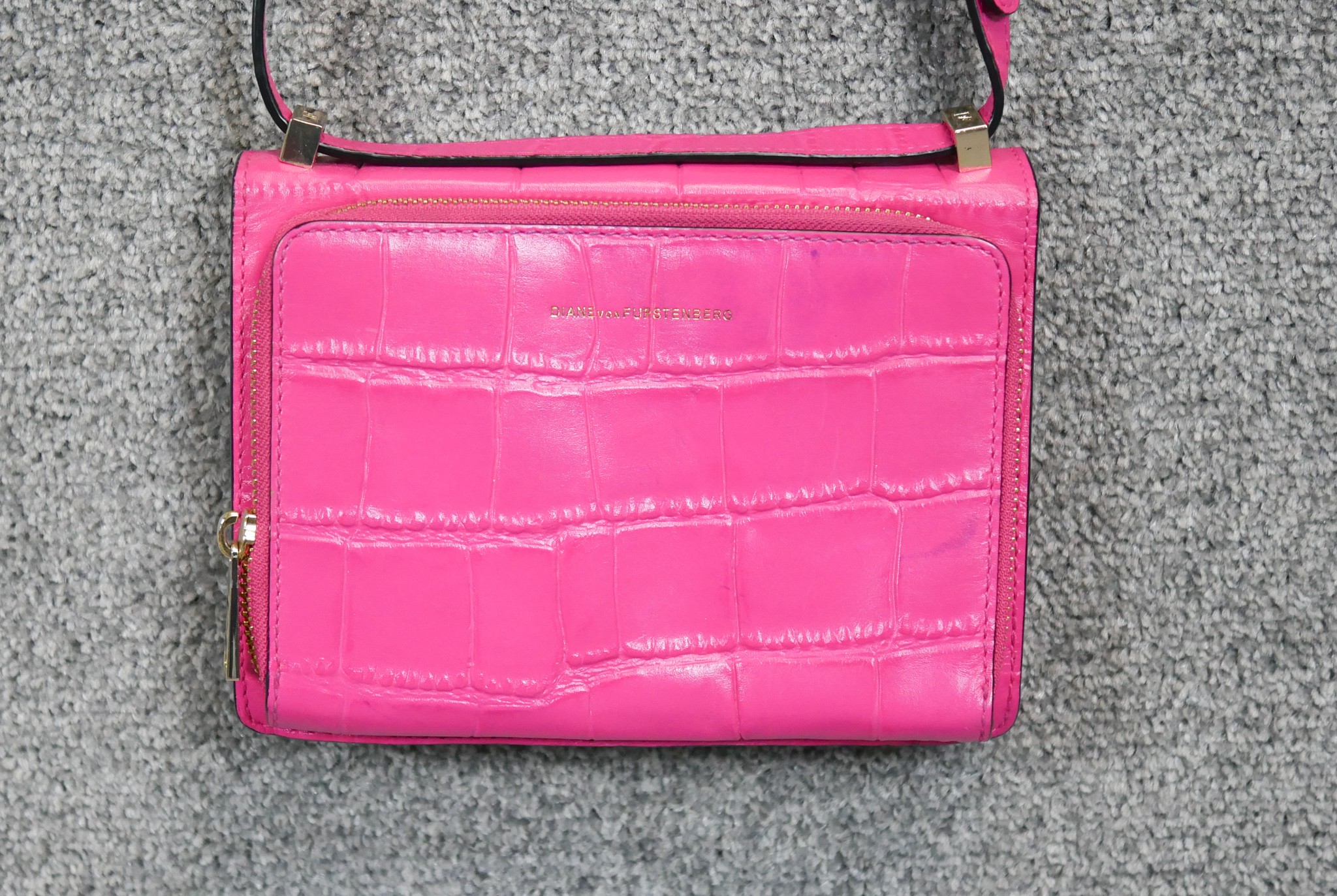 A neon pink Diane Von Furstenberg embossed leather crossbody bag. Brass Hardware and gilded name. - Image 4 of 9