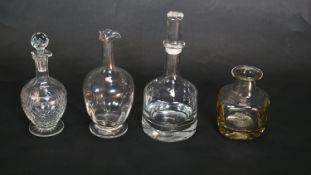 A collection of glassware. Including three crystal decanters including a Frank Thrower, Dartington