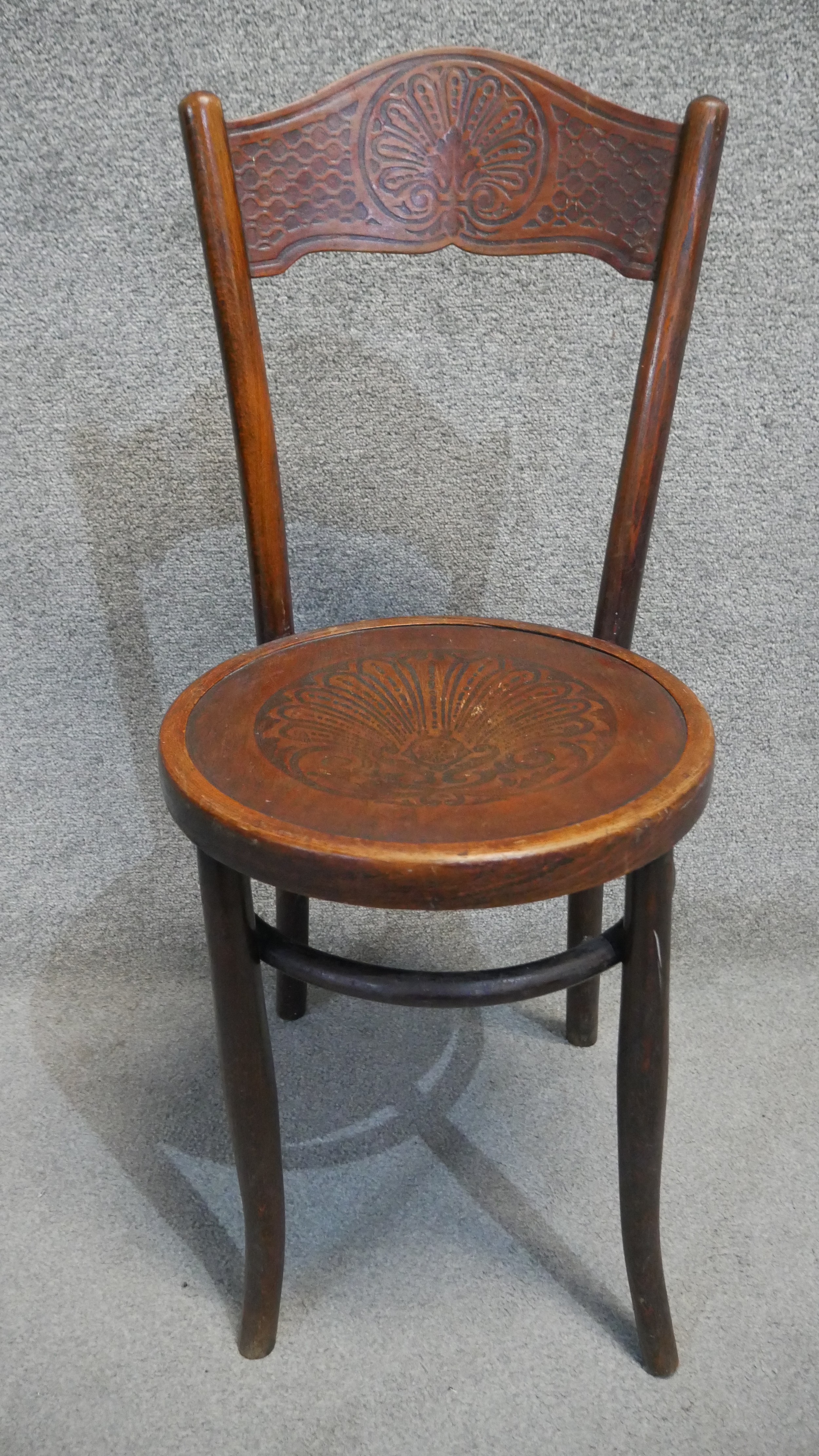 A set of four Mundus 19th century bentwood dining chairs with embossed backs and seats. - Image 2 of 5