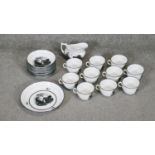 A Victorian black and white transfer printed and hand painted ten person part porcelain tea set (one