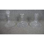 A collection of three various ship's decanters. H.27cm (Tallest).