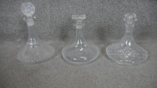 A collection of three various ship's decanters. H.27cm (Tallest).