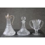 A collection of cut glass and crystal. Including a crystal ships decanter, a silver plated cut glass