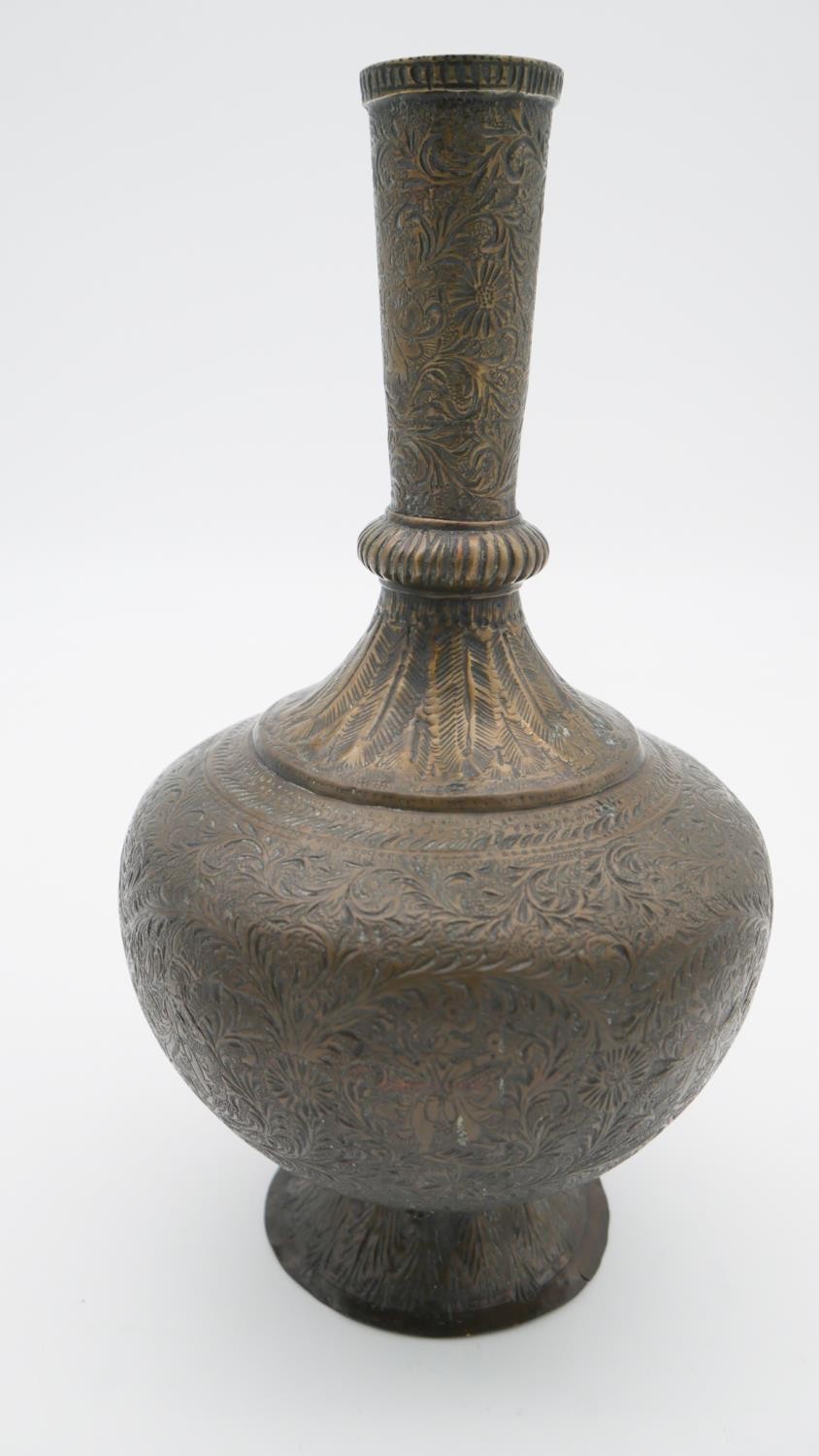 A collection of Indian brassware. An engraved bulbous vase with foliate and floral design and a - Image 4 of 4