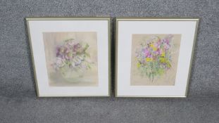 Two framed and glazed pastels on paper of bunches of spring flowers. Signed R. Raymont. H.42 W.87cm