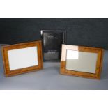 A John Lewis sterling silver easel picture frame along with a pair of marquetry inlaid veneered