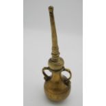 An Indian brass twin handled rose water sprinkler. H.24 W.8cm