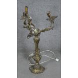A Rococo style gilt bronze foliate design three branch table table lamp with shell form base. H.72CM