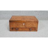 A Georgian mahogany stationery or writing box with fitted interior and base drawer. H.15 W.37 D.26cm